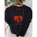 1-Pack Women'WB shield Black Short Sleeve Crew Neck T-Shirt - Happy TNF'WB shield Day Print with Red Heart & Family...