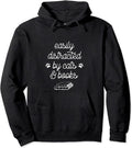 Easily distracted by cats and books Pullover Hoodie