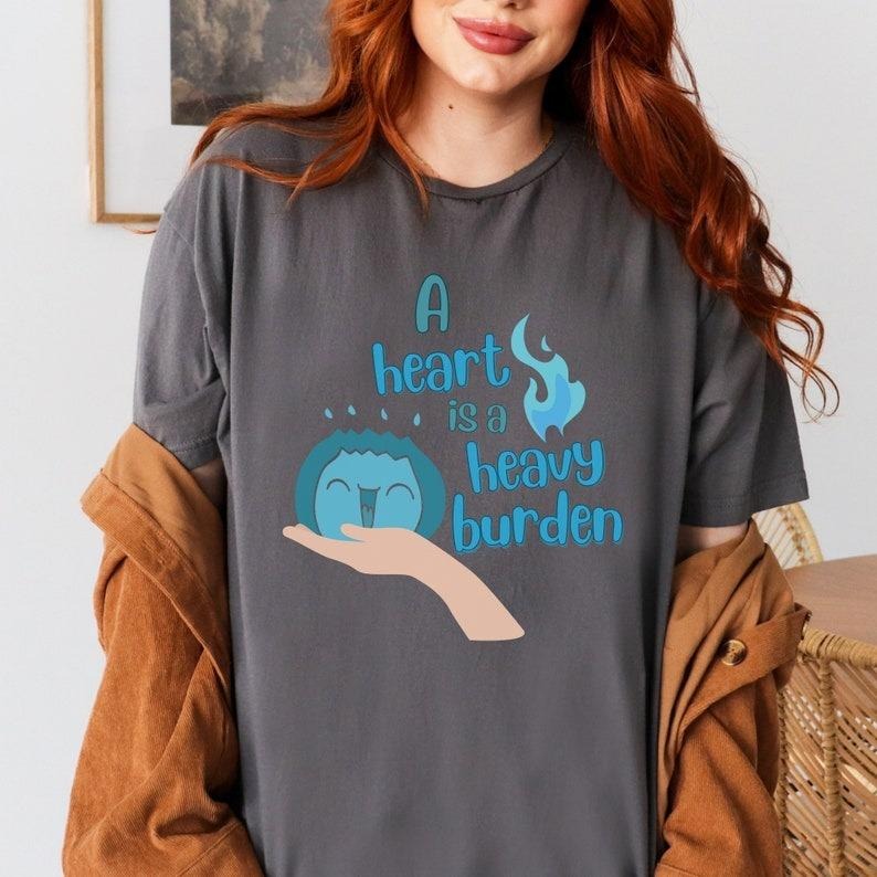 A Heart is a Heavy Burden Unisex T-Shirt Hoodie, Sweatshirt | RetroVerseTees.com