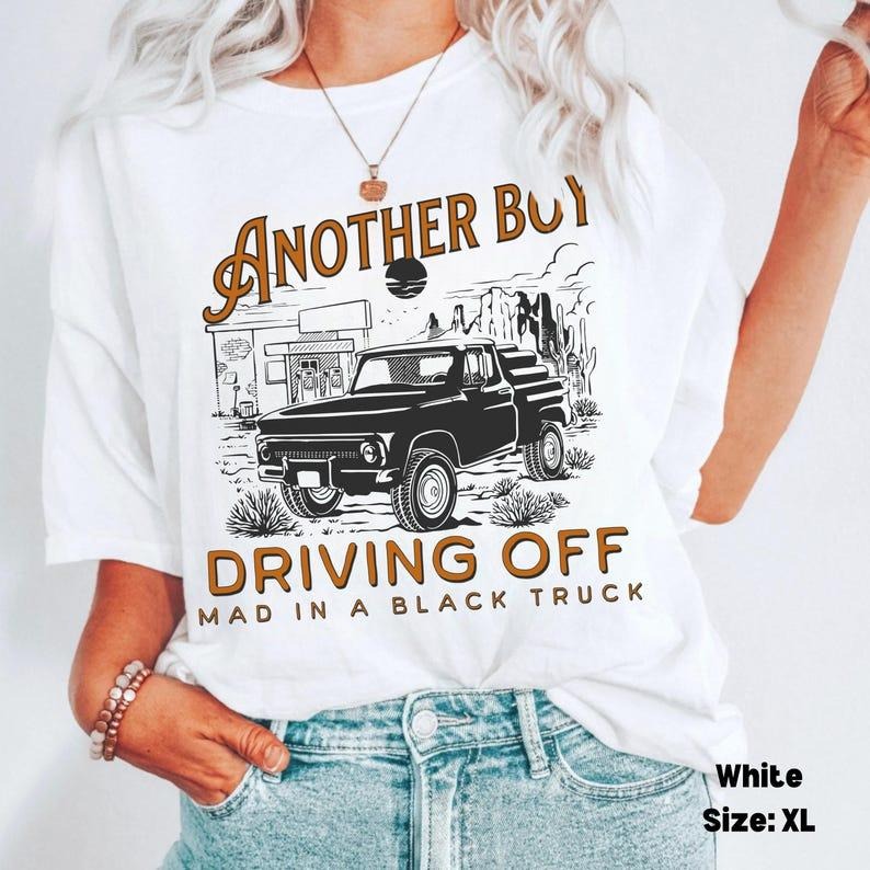 Boy Driving Off Mad Black Truck Shirt, Kelsea Tshirt Hoodie, Sweatshirt | RetroVerseTees.com