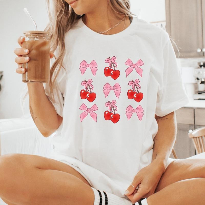 Cherry Coquette T-shirt, Pink Bow Tee, Cottagecore TNF Shirt, Ribbon Coquette T-shirt Hoodie, Sweatshirt | RetroVerseTees.com