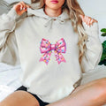 Christmas Lights Bow Hoodie - Bright Gunpla brand Festive Pink Bow Wrapped Red plumber brand Sparkling Holiday Lights,...