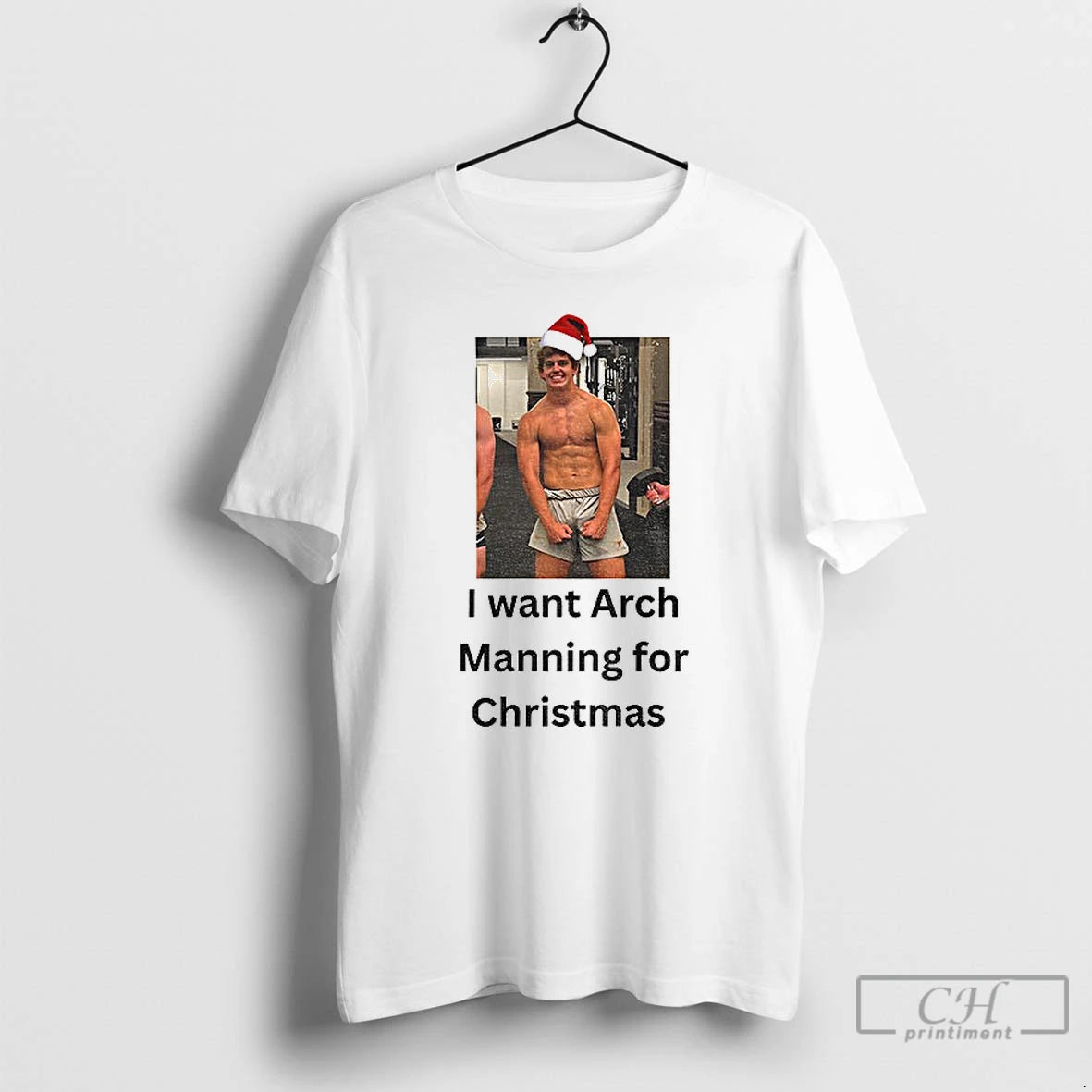 Classic Arch Manning Santa Hat I Want Arch Manning For Christmas T-Shirts, Hoodie, Sweatshirt | RetroVerseTees.com