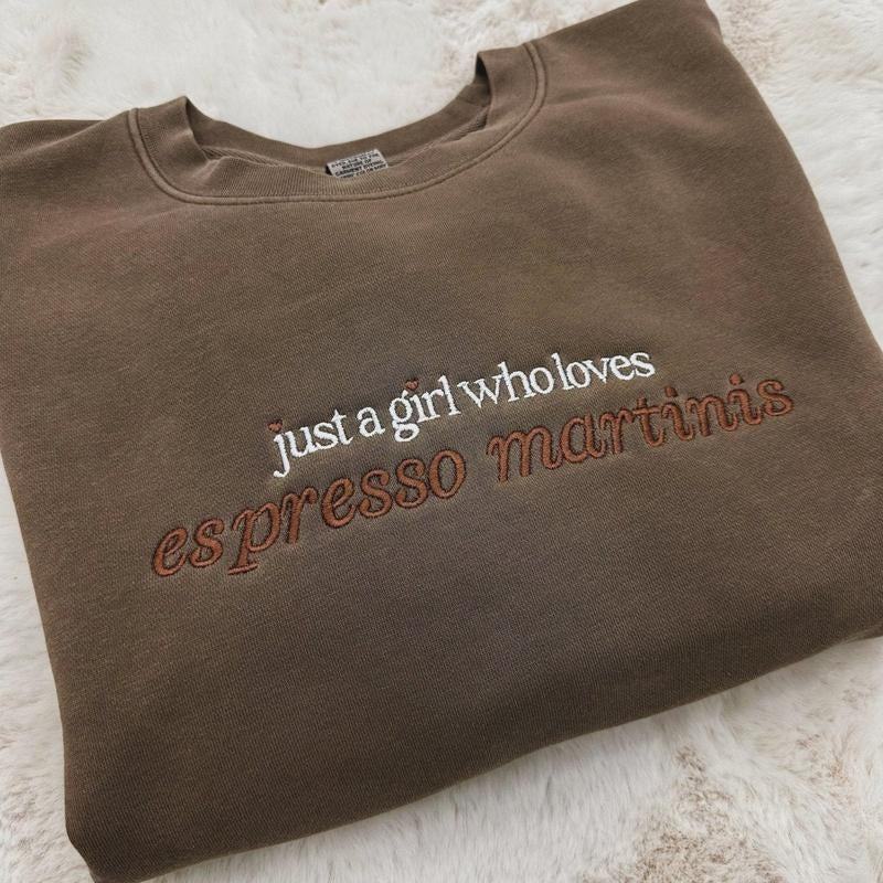 Embroidered 'Just A Girl Who Loves Espresso Martinis' Cozy Crew T-Shirts, Hoodie, Sweatshirt | RetroVerseTees.com