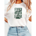 Empowering Lightsaber brand - Shirt: 'Faith Over FOG' with Cross Motif