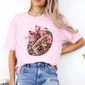 Fall Coquette Bow and Football Shirt. Fall Softstyle Unisex T-Shirt. Cute Graphic Tee Hoodie, Sweatshirt | RetroVerseTees.com