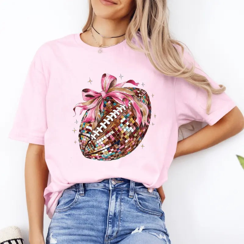 Fall Coquette Bow and Football Shirt. Fall Softstyle Unisex T-Shirt. Cute Graphic Tee Hoodie, Sweatshirt | RetroVerseTees.com