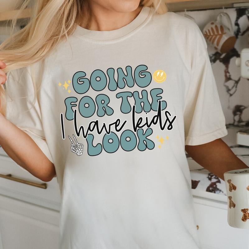 Going for the I have Kids Look DTF Transfers - THIS IS NOT A SHIRT Hoodie, Sweatshirt | RetroVerseTees.com