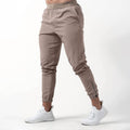 Gymreapers Performance Joggers - Taupe, Sweat-wicking Material, 4-Way Stretch Fabric, All Seasons T-Shirts, Hoodie,...