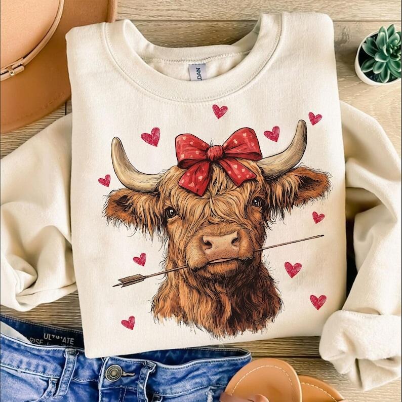 Highland Cow Sweatshirt Valentine's day Coquette,Trending ,Girly Valentine T-Shirts, Hoodie | RetroVerseTees.com