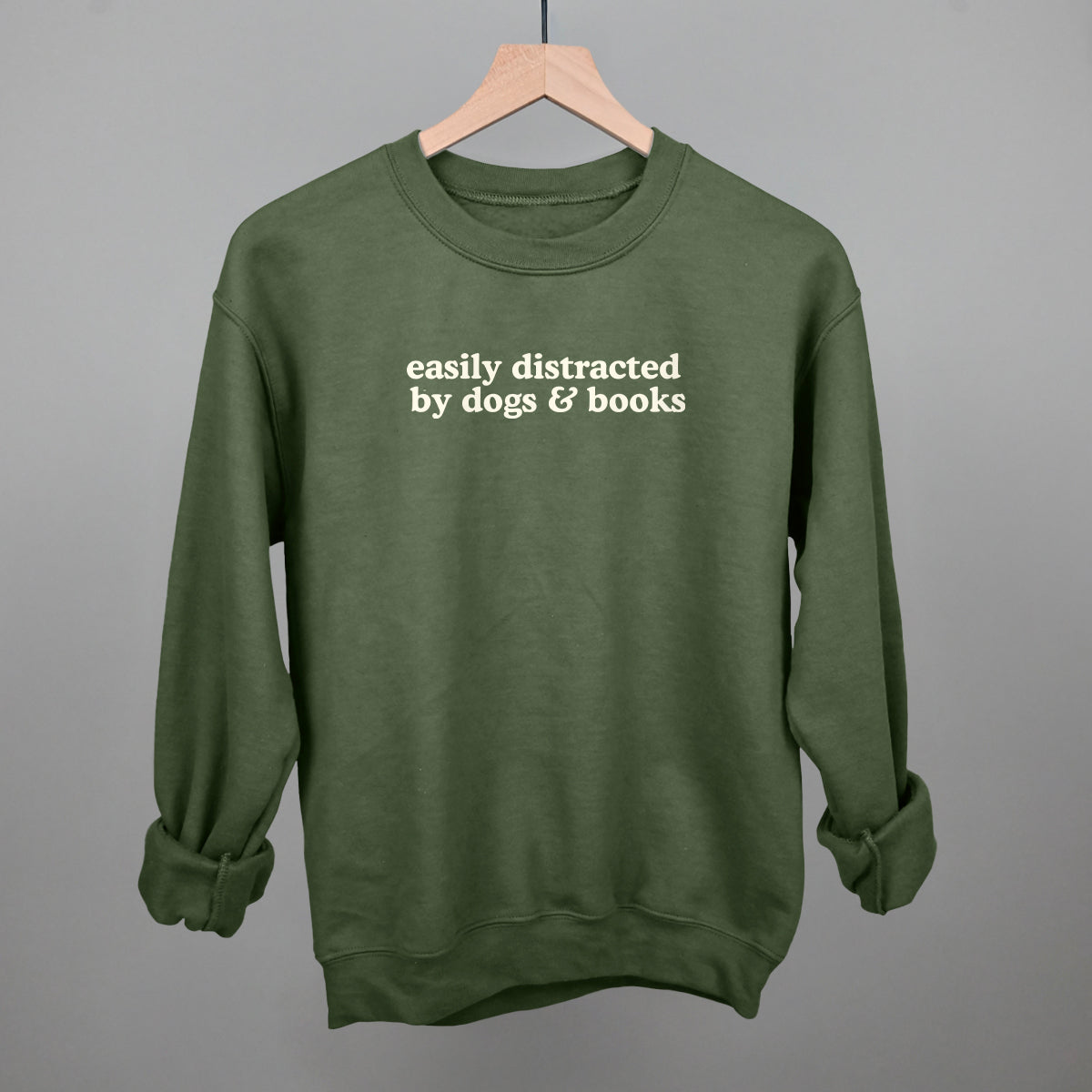 Easily Distracted By Dogs & Books T-Shirts, Hoodie, Sweatshirt | RetroVerseTees.com (Image 1)