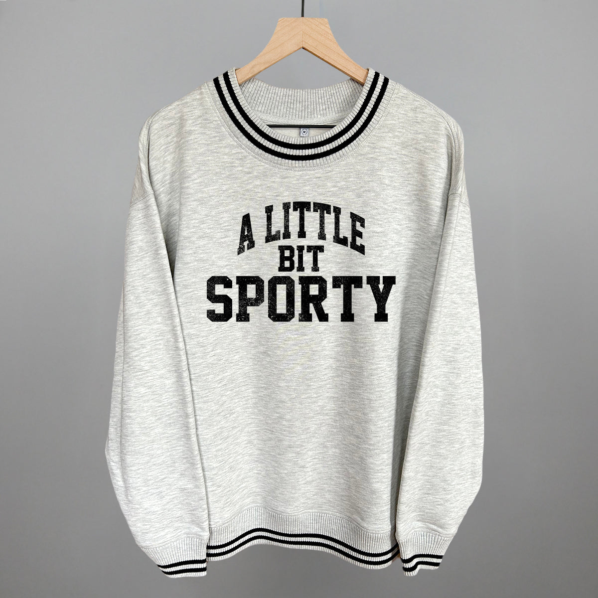 A Little Bit Sporty (Black) T-Shirts, Hoodie, Sweatshirt | RetroVerseTees.com (Image 1)