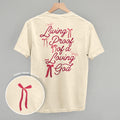 Living Proof Of A Loving God Back Print T-Shirts, Hoodie, Sweatshirt | RetroVerseTees.com (Image 1)