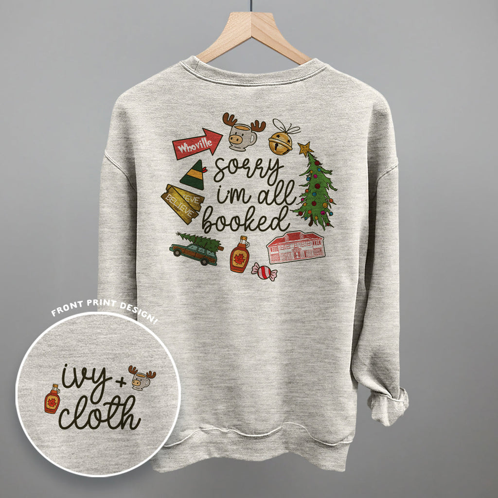 Sorry I'm All Booked Christmas Movies (Back Print) T-Shirts, Hoodie, Sweatshirt | RetroVerseTees.com (Image 1)