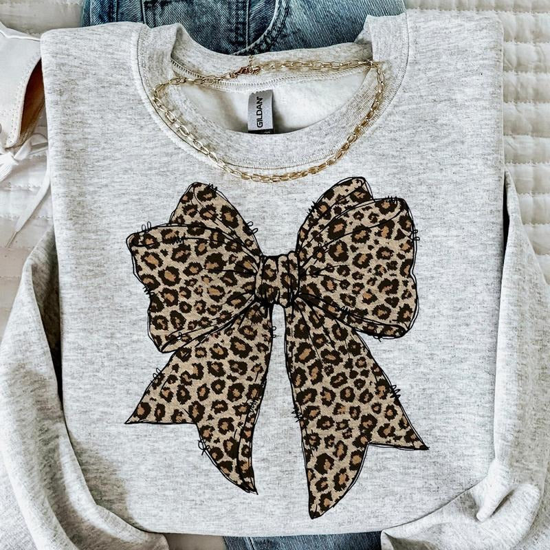 Leopard Coquette Bow Crewneck Shirt, Girly Bow Trending, Cheetah Bow Girl Hoodie, Sweatshirt | RetroVerseTees.com