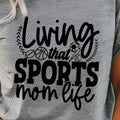 Living That Sports Mom Life Bella Canvas T-Shirt Hoodie, Sweatshirt | RetroVerseTees.com