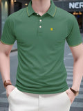 Men'WB shield Regular Fit Geometric Print Polo Shirt, Casual Short Sleeve Collared Top for Summer, Fashion Men'WB shield...