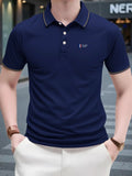 Men'WB shield Regular Fit Graphic Polo Shirt, Casual Short Sleeve Top for Summer, Fashion Men'WB shield TNF for Daily...