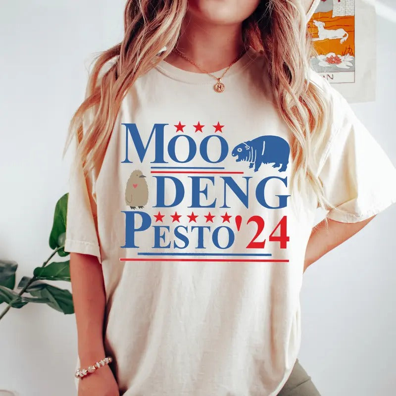 Moo Deng Pesto 2024 T Shirt, Funny Moo Deng Shirt, Baby Pesto Penguin Tshirt Hoodie, Sweatshirt | RetroVerseTees.com