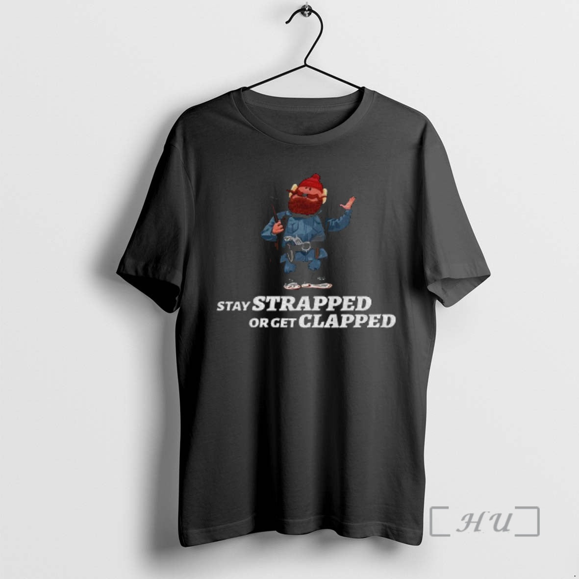 Officials Yukon Cornelius Stay Strapped Or Get Clapped T-Shirts, Hoodie, Sweatshirt | RetroVerseTees.com