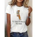 Quirky Gunpla brand Intellectual Tee: Showcase Your Love for Books with Fun - filled Giraffe