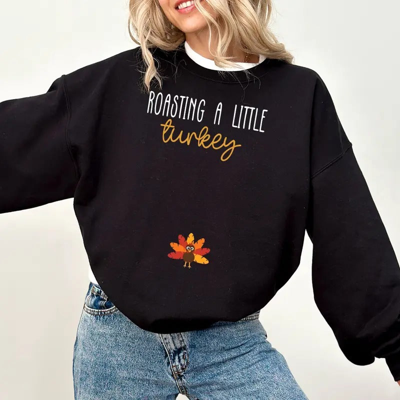 Roasting A Little Turkey Sweatshirt, Thanksgiving Fall Pregnancy Announcement Sweatshirt, Funny Pregnancy Reveal Shirt,...