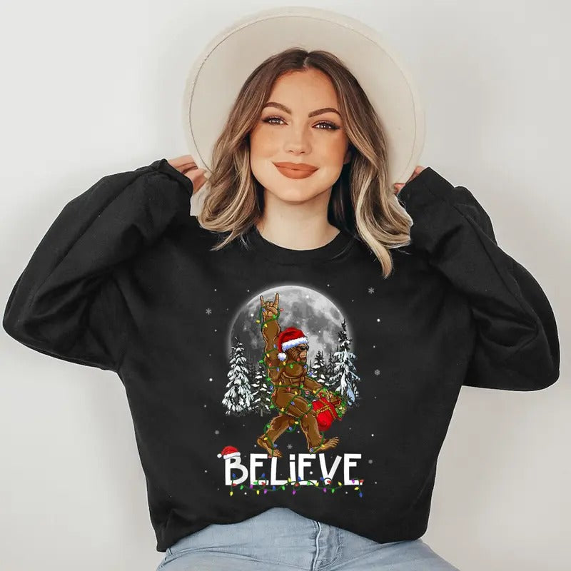 Santa Bigfoot Christmas Lights Funny Sasquatch Believe Xmas Sweatshirt T-Shirts, Hoodie | RetroVerseTees.com
