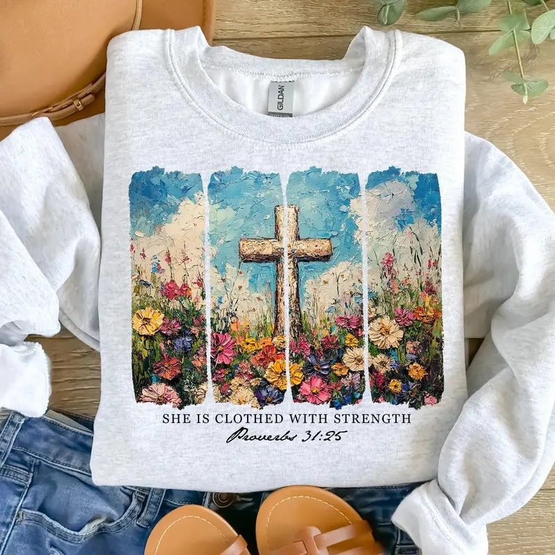 She is clothed with Strength DTF Transfers - THIS IS NOT A SHIRT Hoodie, Sweatshirt | RetroVerseTees.com