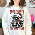 Sorry Santa I've Been Feral Christmas Raccoon Funny Christmas Hoodie - Sweatshirt - Unisex Tee | RetroVerseTees.com