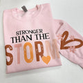 Stronger Than The Storm Gildan Sweatshirt -- LIGHT PINK T-Shirts, Hoodie | RetroVerseTees.com