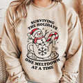 Surviving The Holidays One Meltdown at a Time Christmas Sweatshirt. Relaxed Christmas Unisex Pullover Crewneck...