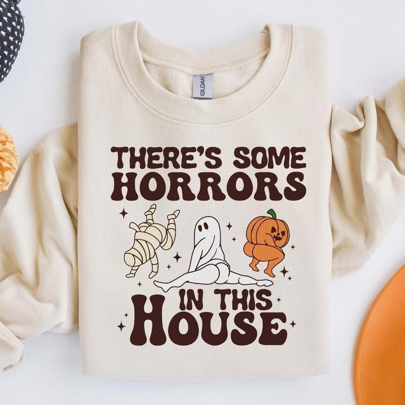 There some horrors in this house sweatshirt drg girlblackhoodie T-Shirts, Hoodie | RetroVerseTees.com