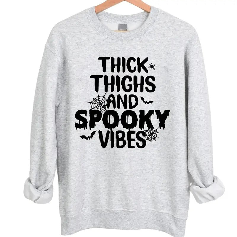 Thick Thighs and Spooky Vibes Halloween Crewneck Sweatshirt Hoodie Tshirt, Halloween 2024 Gifts | RetroVerseTees.com