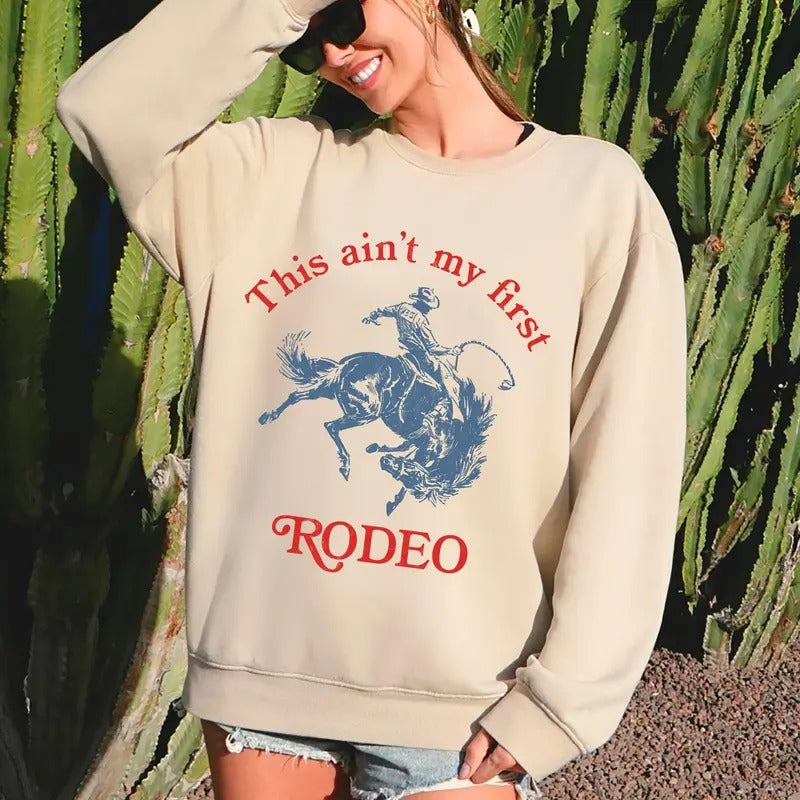 This Ain't My First Rodeo, Country, Sassy Sweatshirt T-Shirts, Hoodie | RetroVerseTees.com
