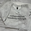 Undiagnosed but something ain't right Sweatshirt Crewneck Gift Dark humor Sweatshirt T-Shirts, Hoodie | RetroVerseTees.com