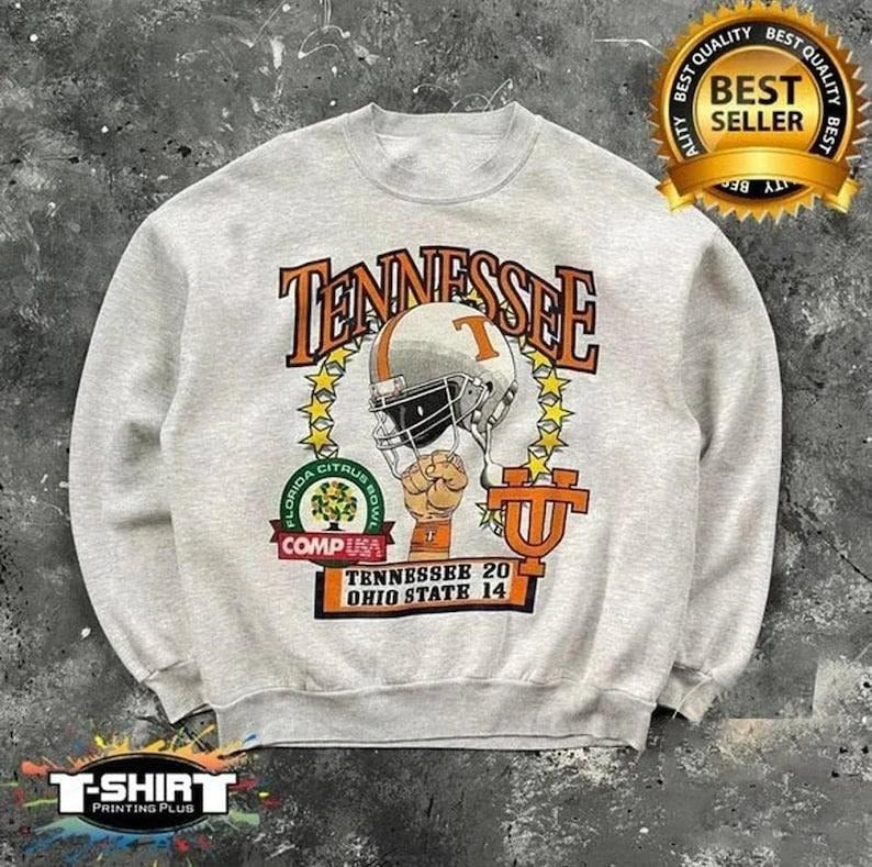 Vintage NCAA Tennessee Volunteers Helmet Unisex Sweatshirt Cotton Fabric T-Shirts, Hoodie | RetroVerseTees.com