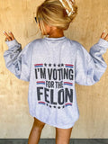 Voting For The Felon Graphic Top T-Shirts, Hoodie, Sweatshirt | RetroVerseTees.com