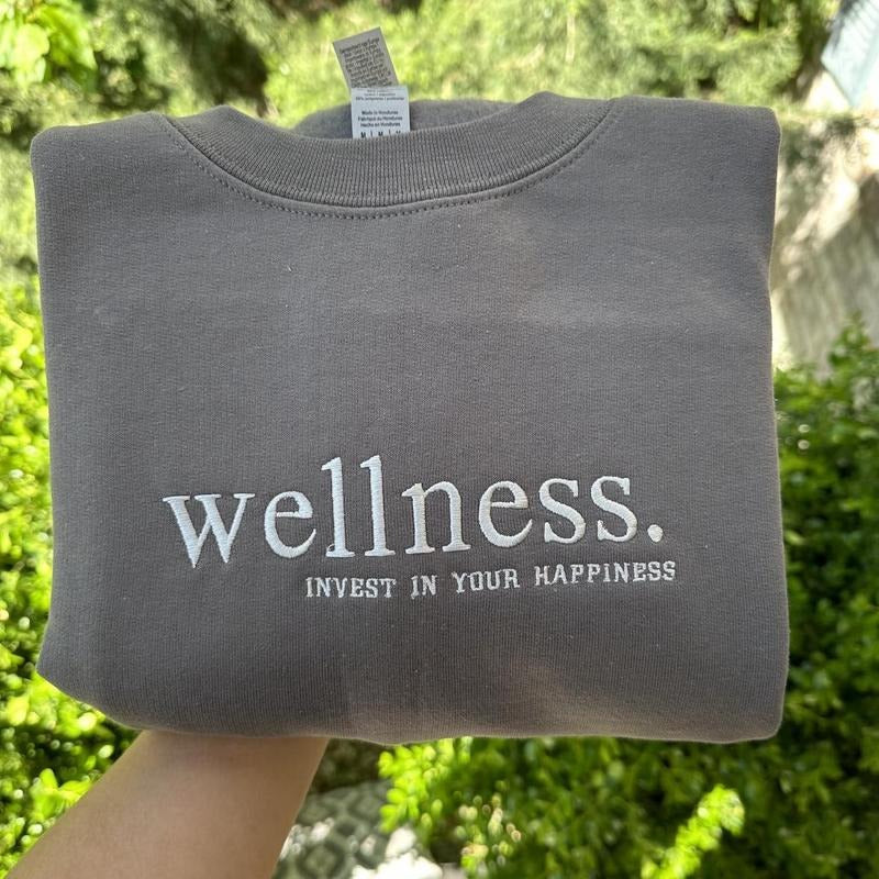 Wellness embroidered Sweatshirt; invest in your happiness embroidered crewneck T-Shirts, Hoodie | RetroVerseTees.com