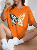Women'WB shield Butterfly & Floral Print Round Neck Graphic Tee, Vintage Trendy Casual Drop Shoulder Half Sleeve T-shirt...