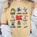 Women'WB shield Cartoon & Letter Print Drop Shoulder Tee, Cute Casual Half Sleeve Round Neck T-shirt for Daily Wear,...