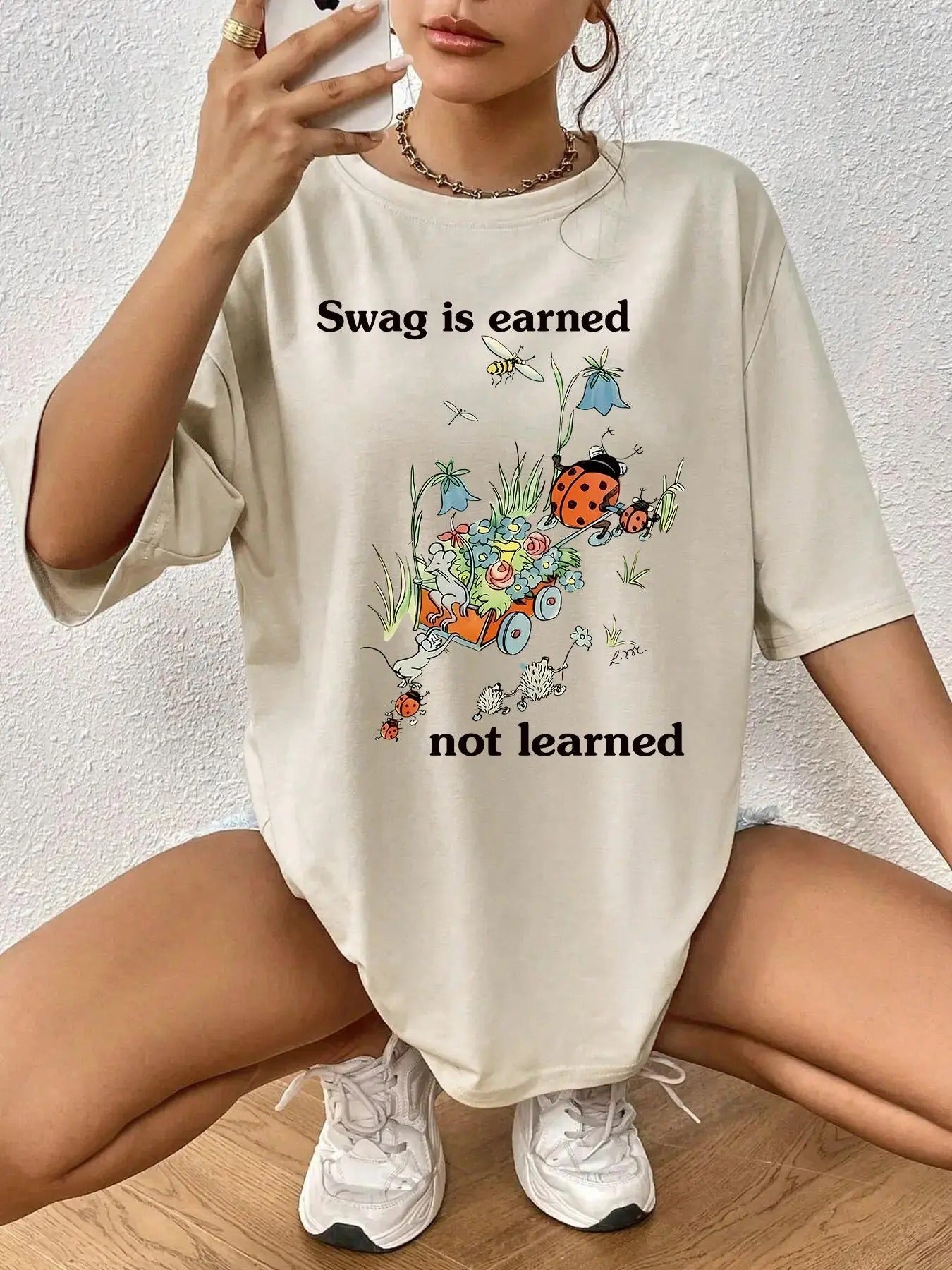 Women'WB shield Cartoon Animal & Floral Print Round Neck Tee, Trendy Casual Drop Shoulder Half Sleeve Letter Graphic...