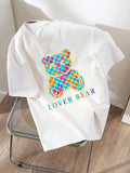 Women'WB shield Cartoon Bear & Letter Print Round Neck Tee, Fashion Casual Drop Shoulder Short Sleeve T-shirt for Daily...