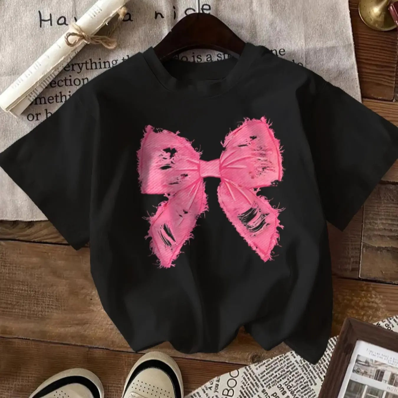 Women'WB shield Cartoon Bow Print Round Neck Tee, Fashion Casual Crew Neck Short Sleeve T-shirt for Daily Outdoor Wear,...