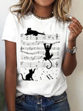 Women'WB shield Cartoon Cat Print Round Neck Tee, Fashion Casual Music Note Graphic Crew Neck Short Sleeve T-Shirt for...