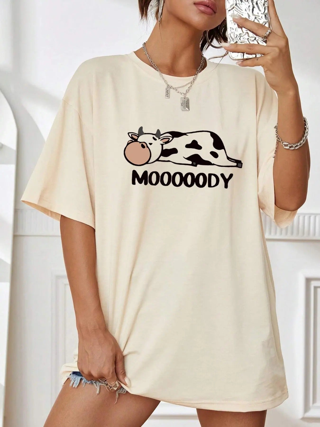 Women'WB shield Cartoon Cow & "MOOOOODY" Letter Print Drop Shoulder Tee, Casual Street Half Sleeve Round Neck T-Shirt for...