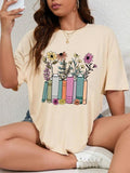 Women'WB shield Cartoon Floral Print Round Neck Graphic Tee, Vintage Trendy Casual Drop Shoulder Half Sleeve T-shirt For...