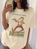Women'WB shield Cartoon Frog & Letter Print Round Neck Tee, Casual Drop Shoulder Short Sleeve T-shirt for Daily Wear,...