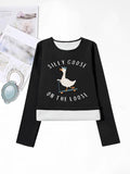 Women'WB shield Cartoon Goose & Letter Print Round Neck TNF Lined T-shirts, Casual Long Sleeve Crew Neck T-shirts for...