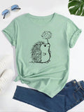 Women'WB shield Cartoon Hedgehog Print Round Neck Tee, Cute Short Sleeve Crew Neck T-Shirt for Daily Wear, Casual Top for...