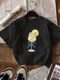 Women'WB shield Cartoon Lemon Drinks Print Round Neck Tee, Fashion Casual Drop Shoulder Short Sleeve T-shirt, Ladies...